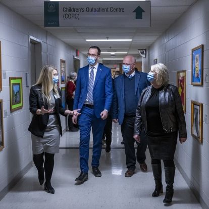 Government representatives tour the Children's Outpatient Clinic