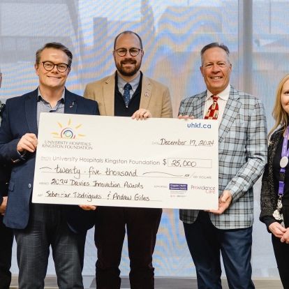 Cheque presentation with Tom Zsolnay, Jason Hann, Sebastian Rodríguez-Llamazares, Greg Davies, and Darcy Woods-Fournier