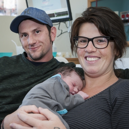 Proud parents Jamin and Natalie George with their baby girl, born via water birth at Kingston General Hospital, on August 29, 2014.