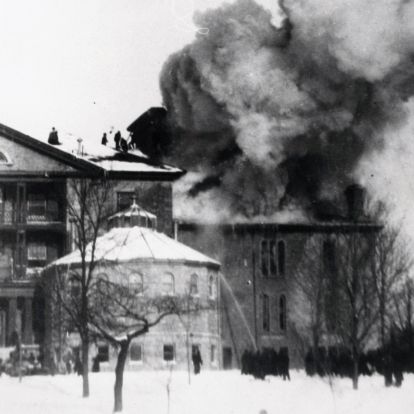 Fire engulfs the Watkins Wing in 1897. Firemen and volunteers managed to save the main building by passing buckets of water.