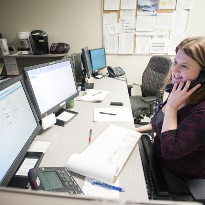 Registration Clerk Amiedawn Esford can now assign inpatient beds using the Emergency Department Information System (EDIS) instead of waiting for a paper form to arrive.