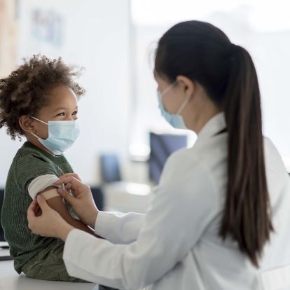 Child being vaccinated