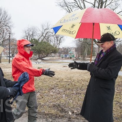 Dr. Pichora and Jim Flett greet each other in City Park, a mid-way point between the two hospitals, for a celebration to mark the integration of KGH and HDH.