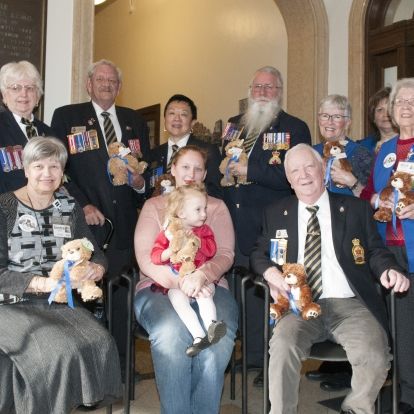Members of the KGH Auxiliary and the Royal Canadian Legion, help Spencer and her mother Jessica launch the 2018 campaign
