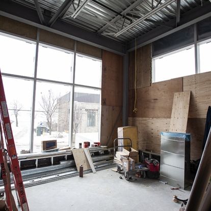 The new patient waiting area for the second MRI is a bright and open space overlooking Lake Ontario