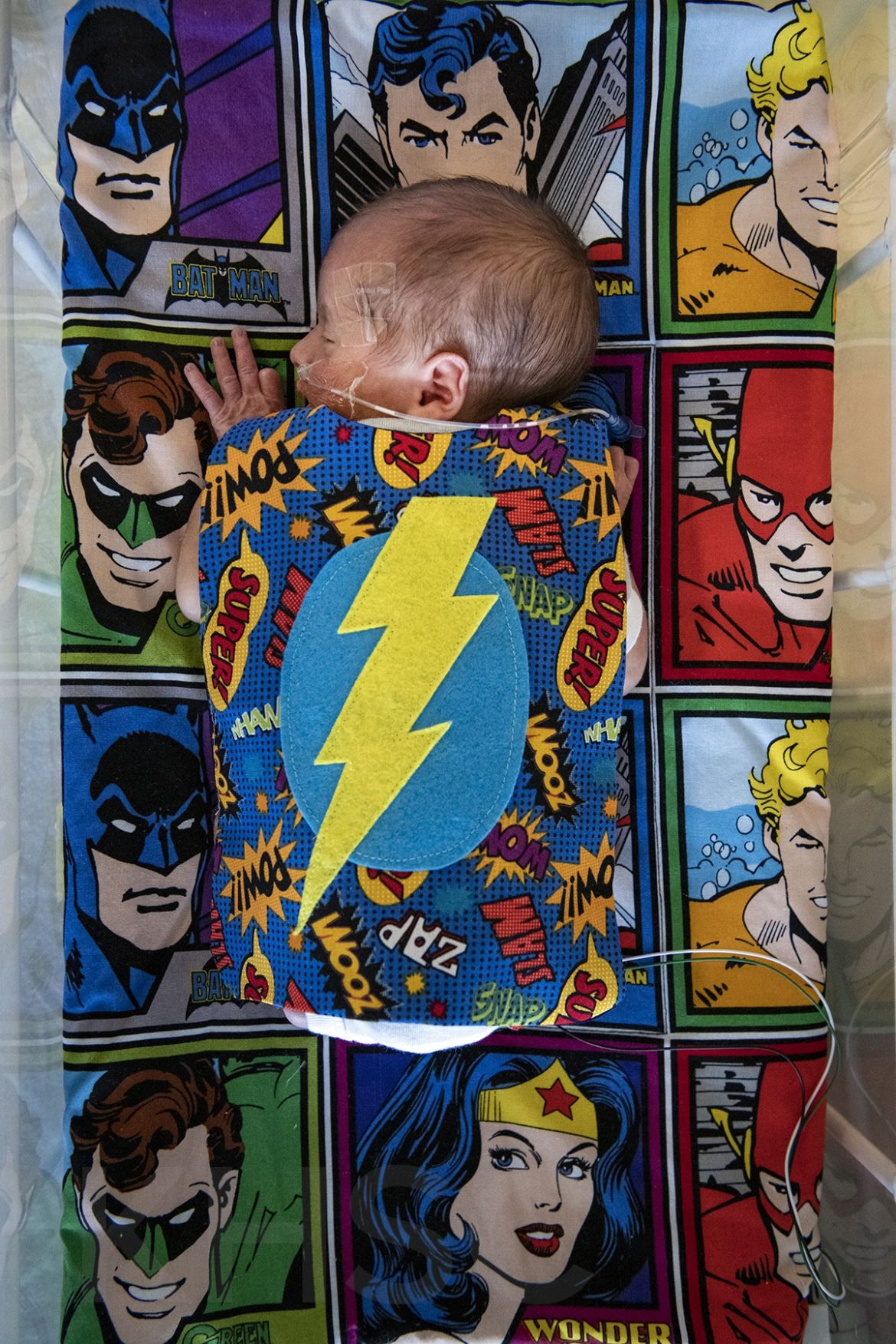 baby in superhero gear