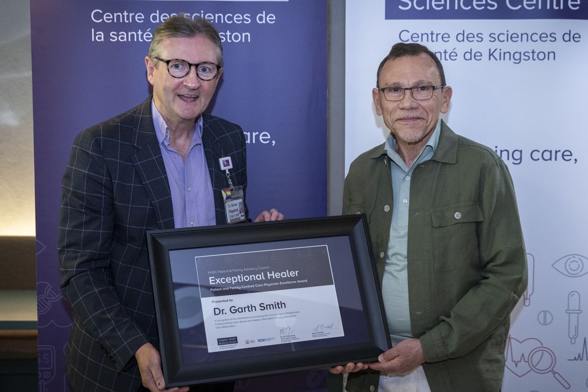 presenting the Exceptional Healer Award to Dr. Garth Smith