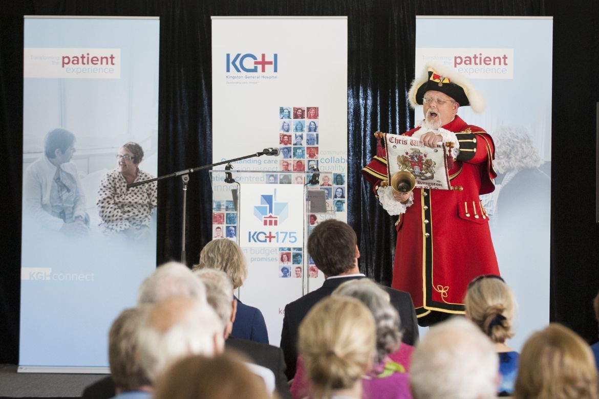Kingston Town Crier Chris Whyman helps spread the news about KGH's anniversary.
