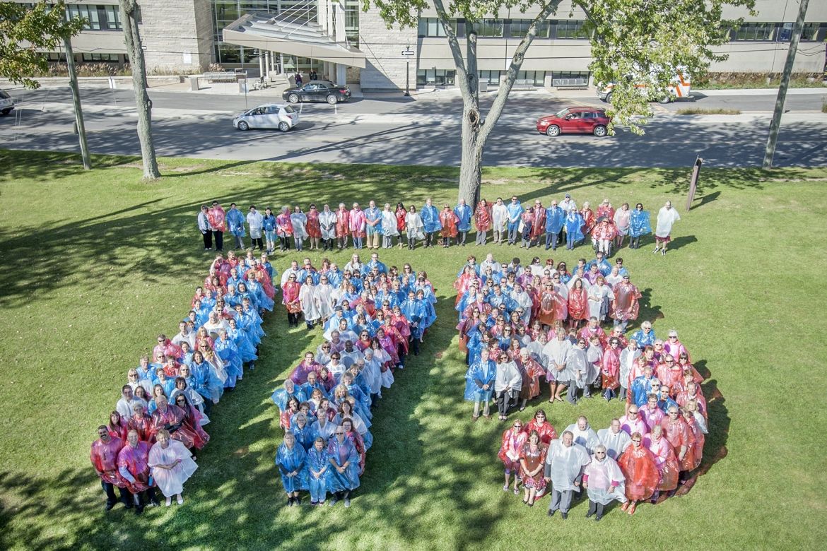 As part of the festivities, about 300 people put on colourful ponchos and stood shoulder-to-shoulder in this commemorative photograph to help us celebrate 175 years and counting.