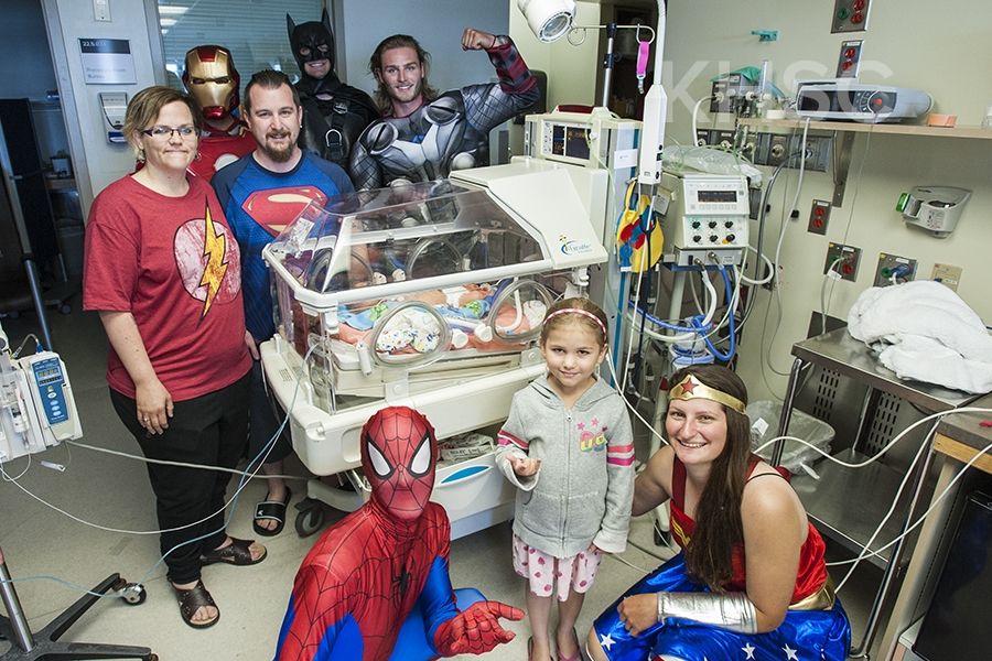 Superheroes from Elite Window Cleaning bring smiles to our youngest patients at our KGH site.