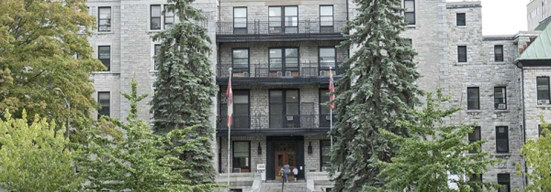 A view of Watkins entrance from Stuart St.