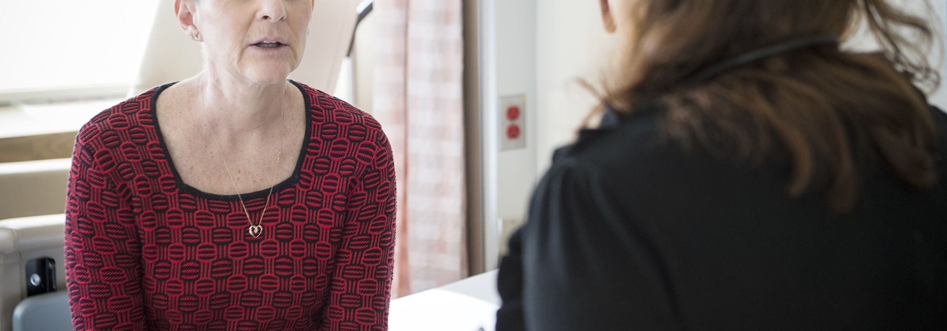 Stem cell patient talking to the doctor.