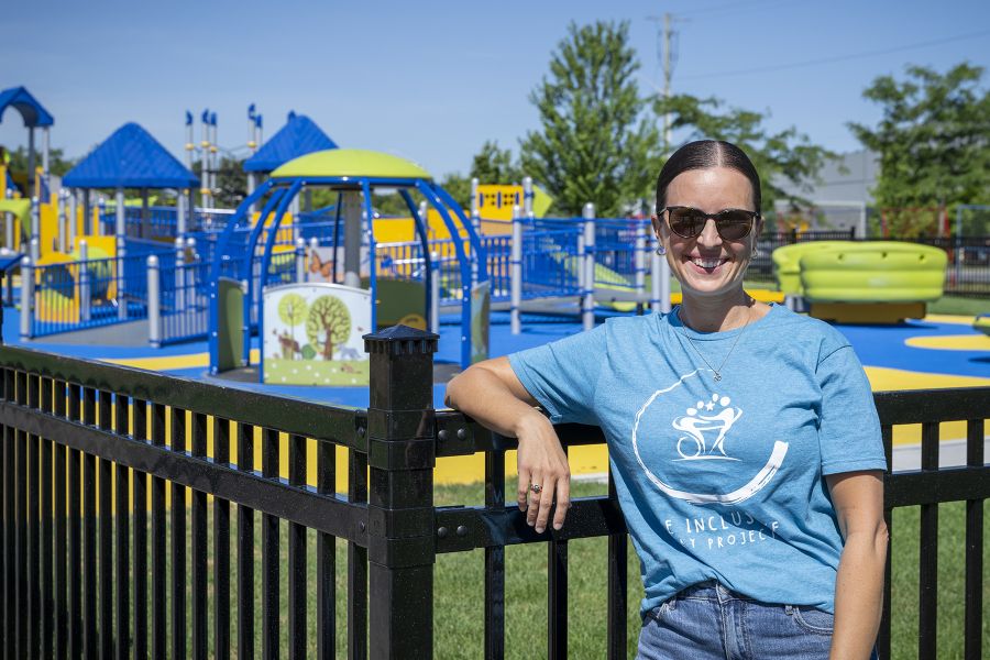 Rachel stands at the new inclusive playground located at Shannon Park