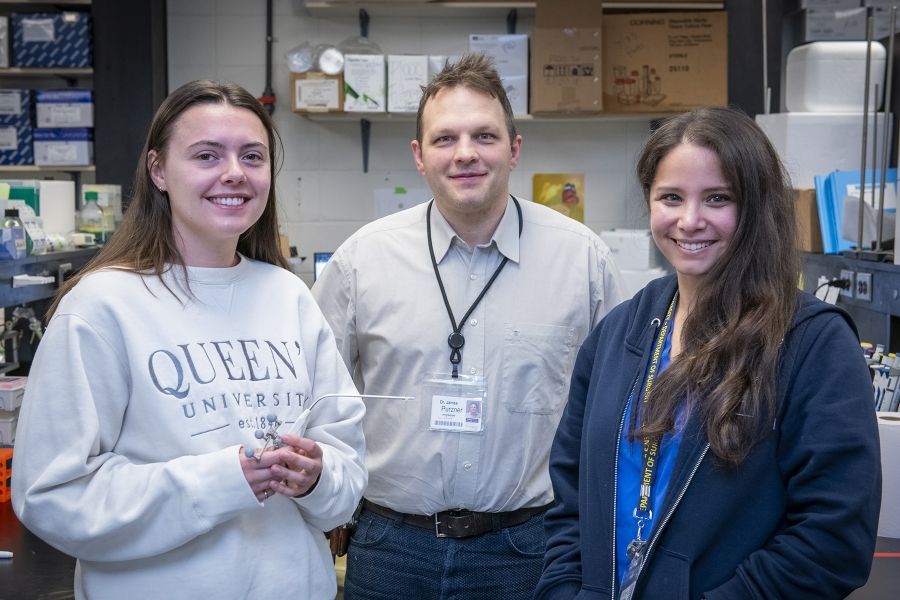 PHD student Kaytlin Andrews and Drs. James and Teresa Purzner