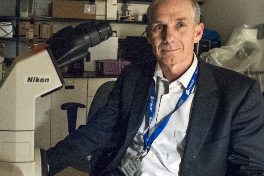 Dr. Vanner at the microscope