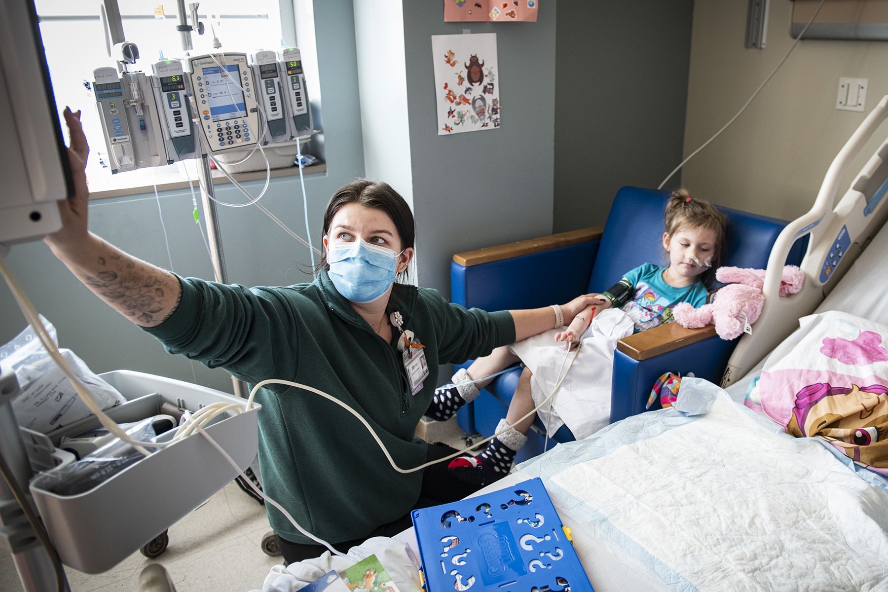 Nurse delivers care to a young patient