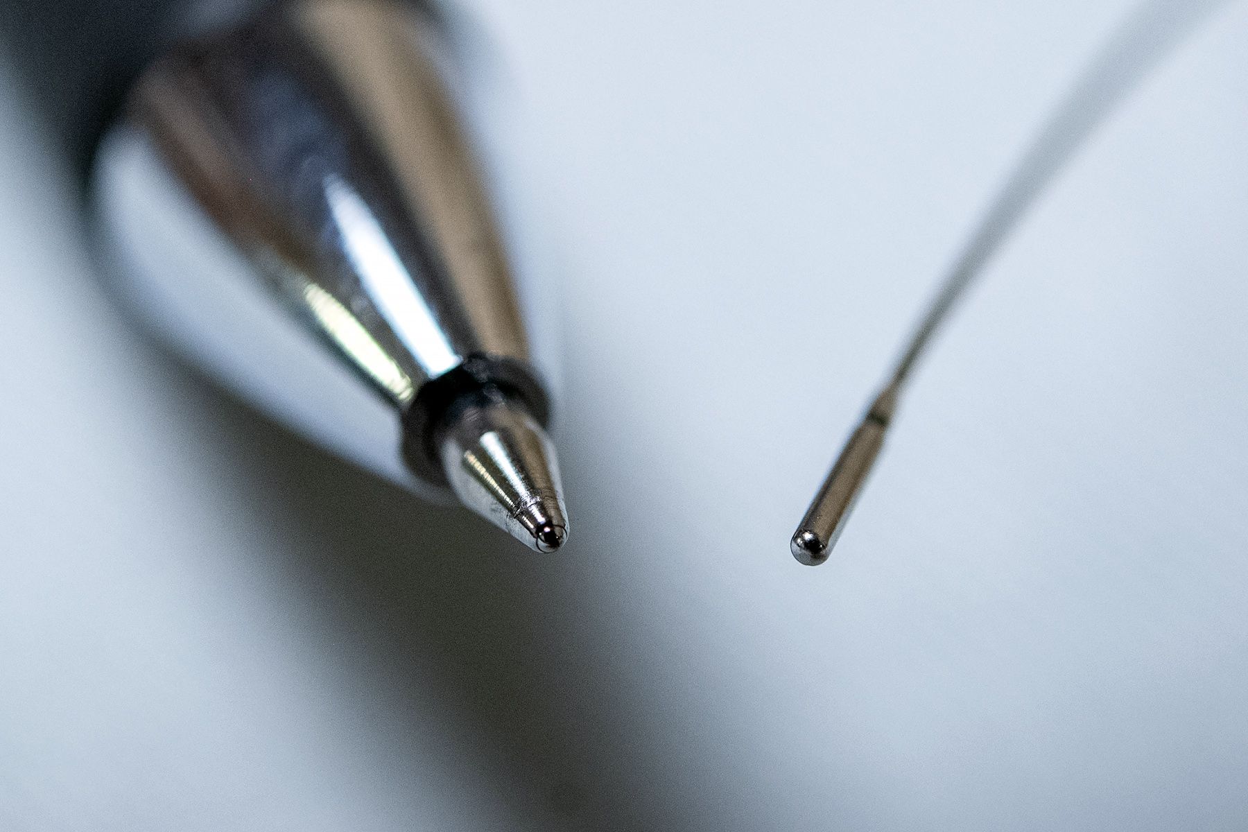 radioactive tool shown beside a pen for scale 