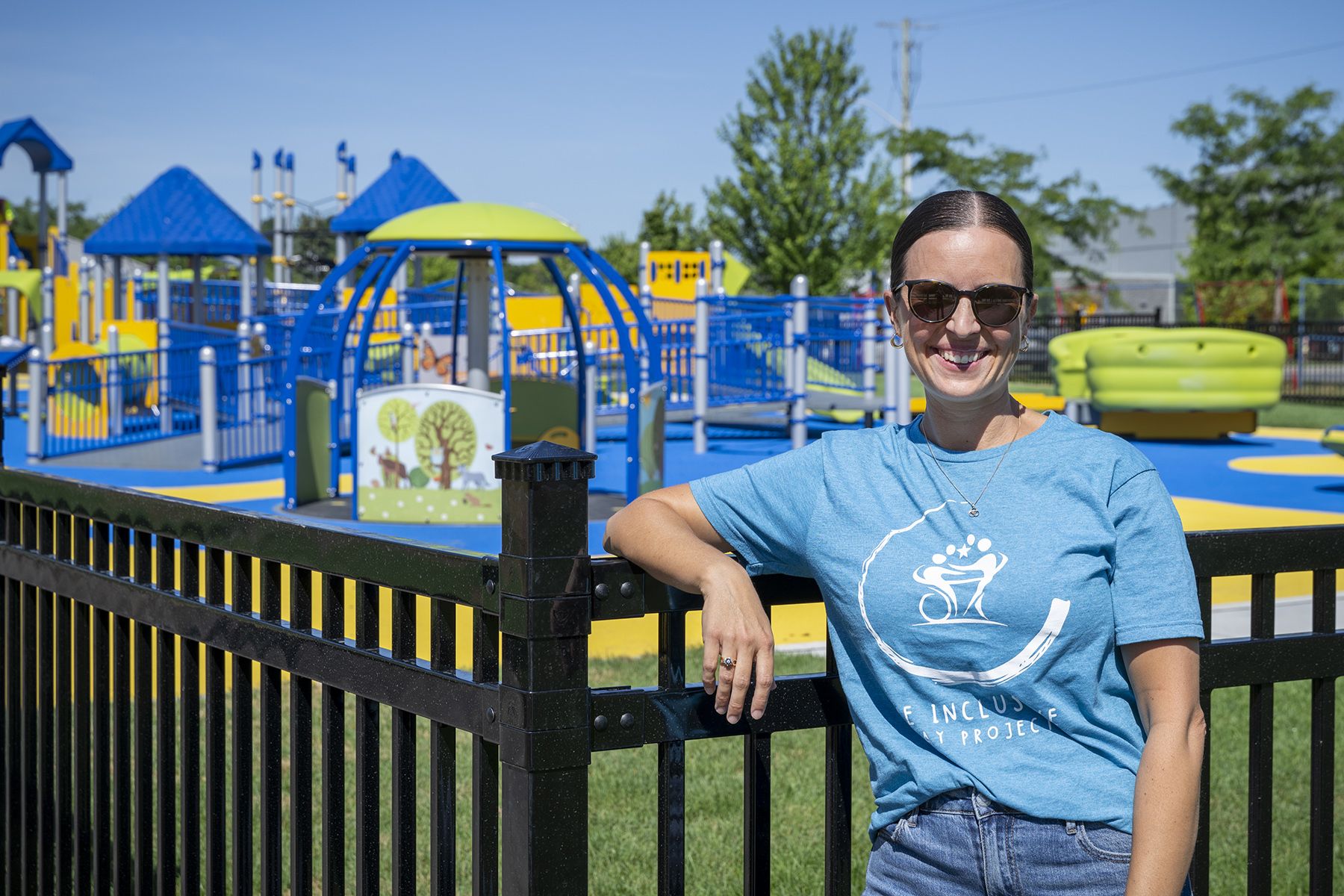 Rachel stands at the new inclusive playground located at Shannon Park