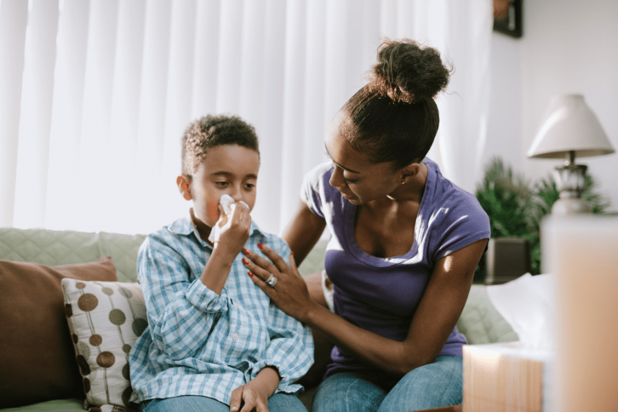 Mother caring for sick child