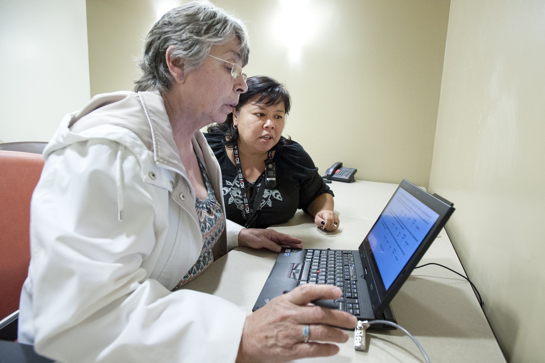 Nurse helping patient, follow up appointment, cancer care, evaluation