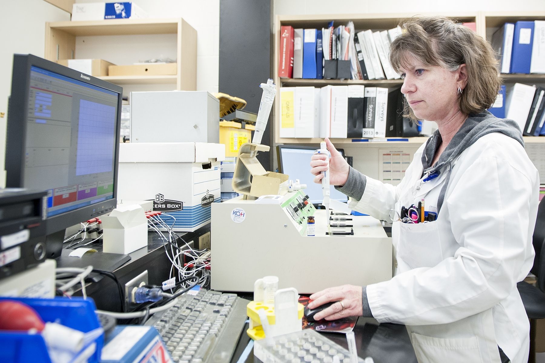 Medical Lab Technologist Shari Neal performs a test in the Special Coagulation Laboratory. The team in the Lab has been nominated in recognition of their support to the Bleeding Disorders Clinic of Southeastern Ontario.