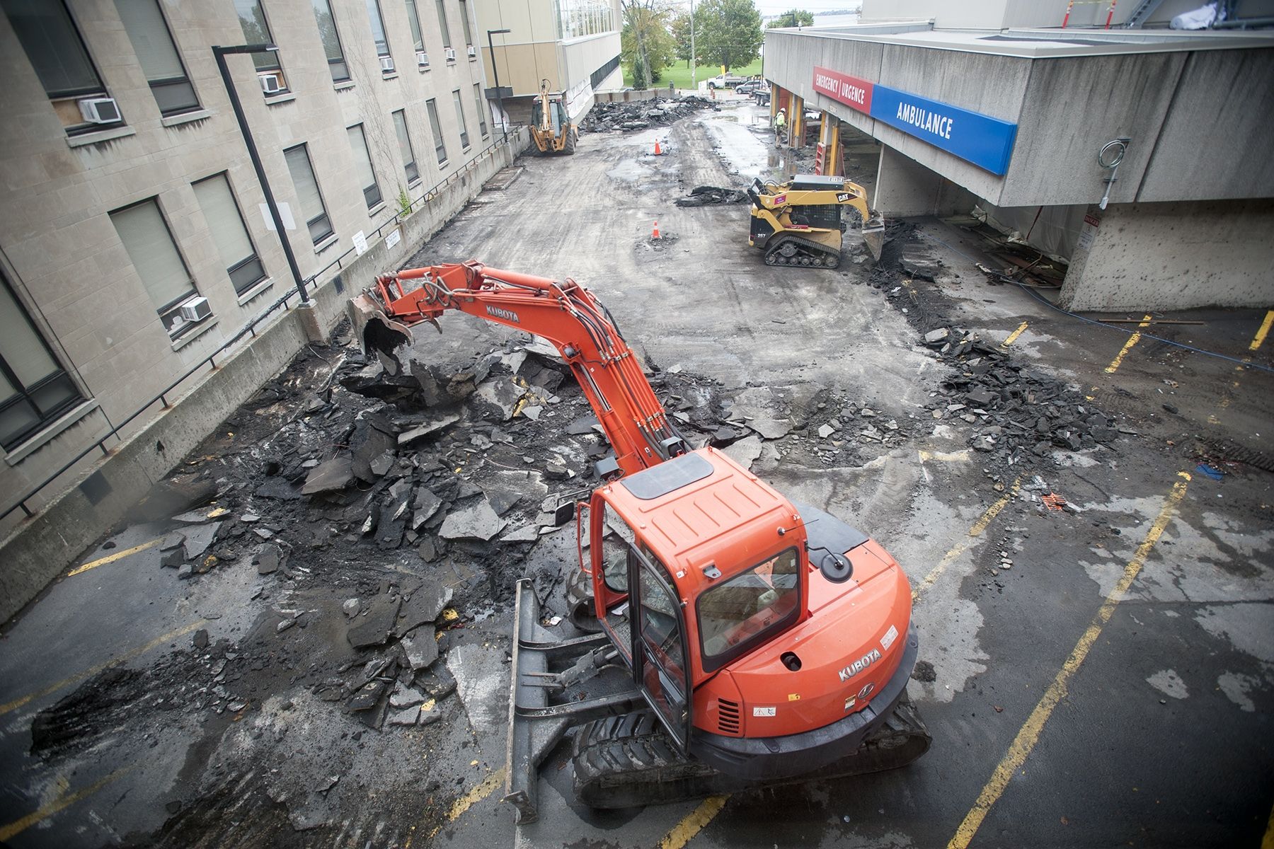 Construction crews remove the pavement from the KGH emergency ramp