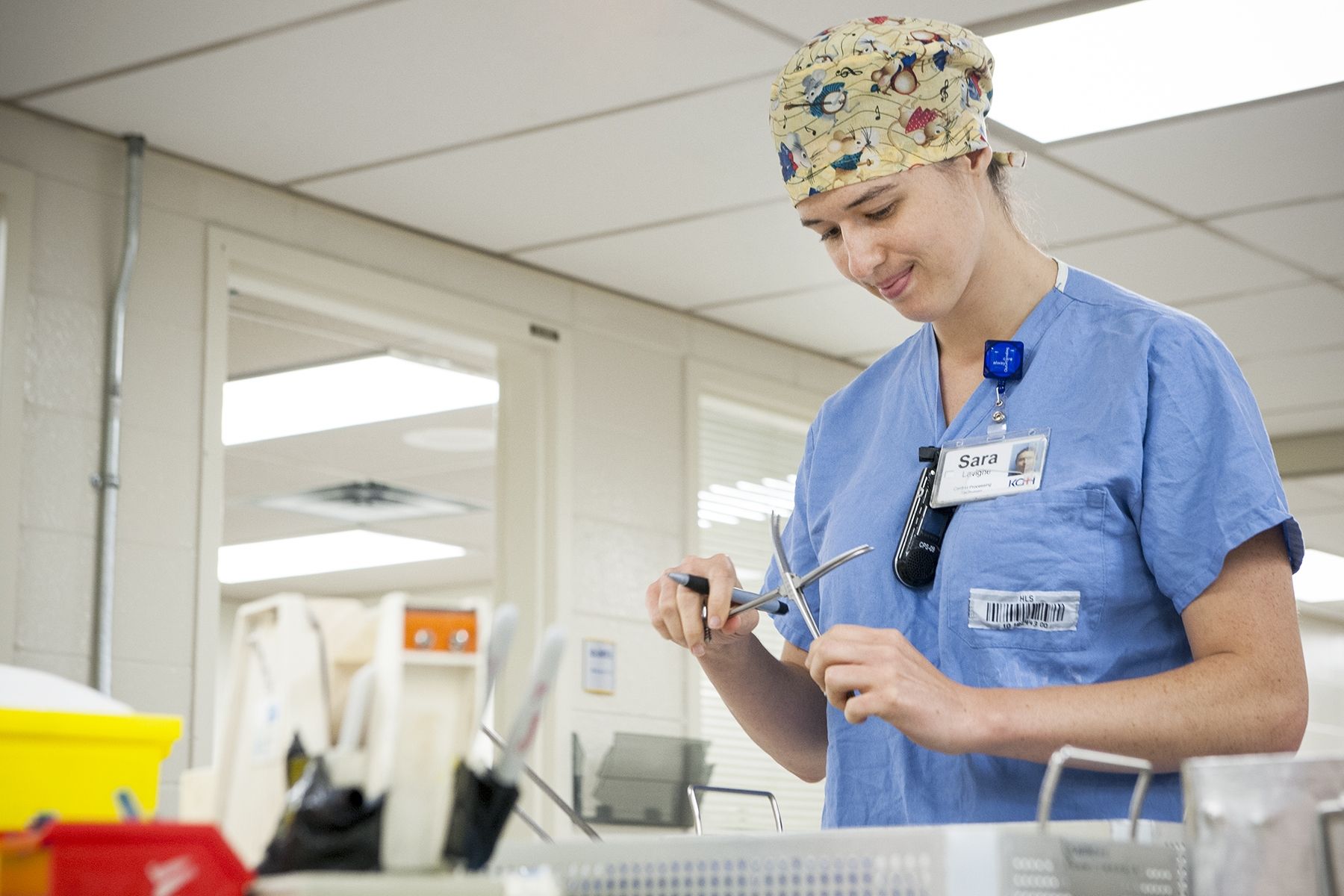 Sara Lavigne, Central Processing Technician, sports one of KGH's new ID clips. The clips are being handed out across the hospital to ensure people wear their ID at chest level.