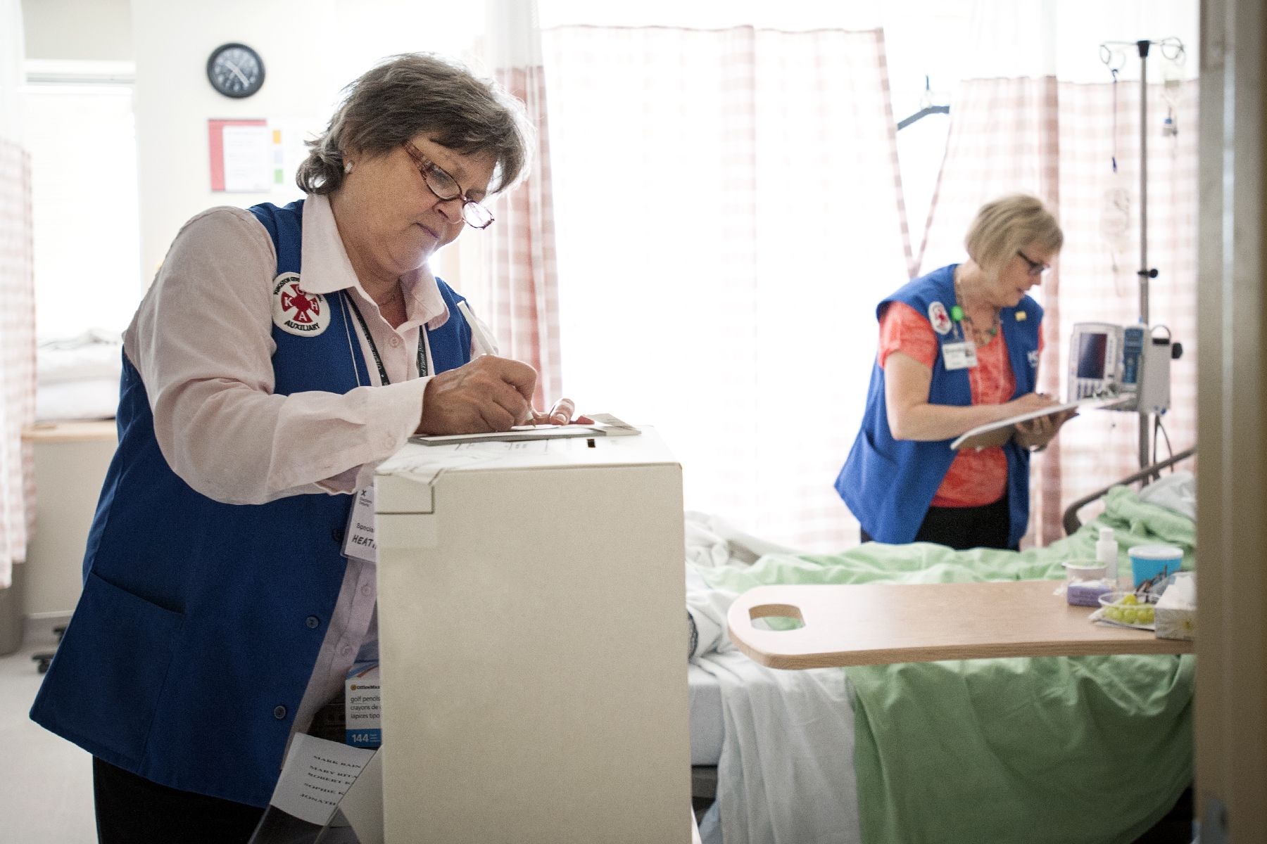 KGH employees filling in charts