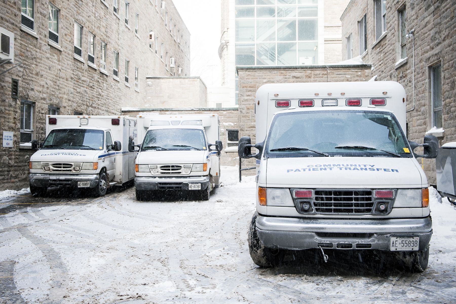 A few vehicles from the Community Patient Transfer Group parked at KGH to facilitate non-urgent patient transfers.
