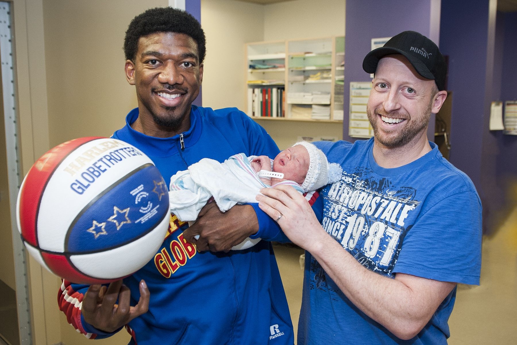 Harlem Globetrotter Anthony "Buckets" Blakes visited KGH's Pediatrics unit before a game at the K-Rock Centre.