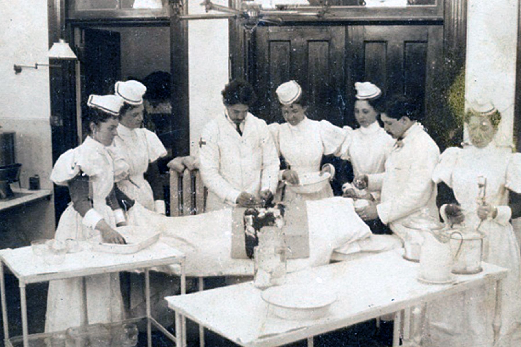 A mock scene of an operation in the Fenwick Operating Theatre. (c. 1896)
