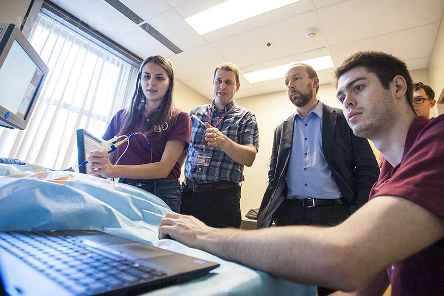 Dr. Zoltan Tataks, inventor of the iKnife receives a demo of the visual mapping technology from the Perk Lab team