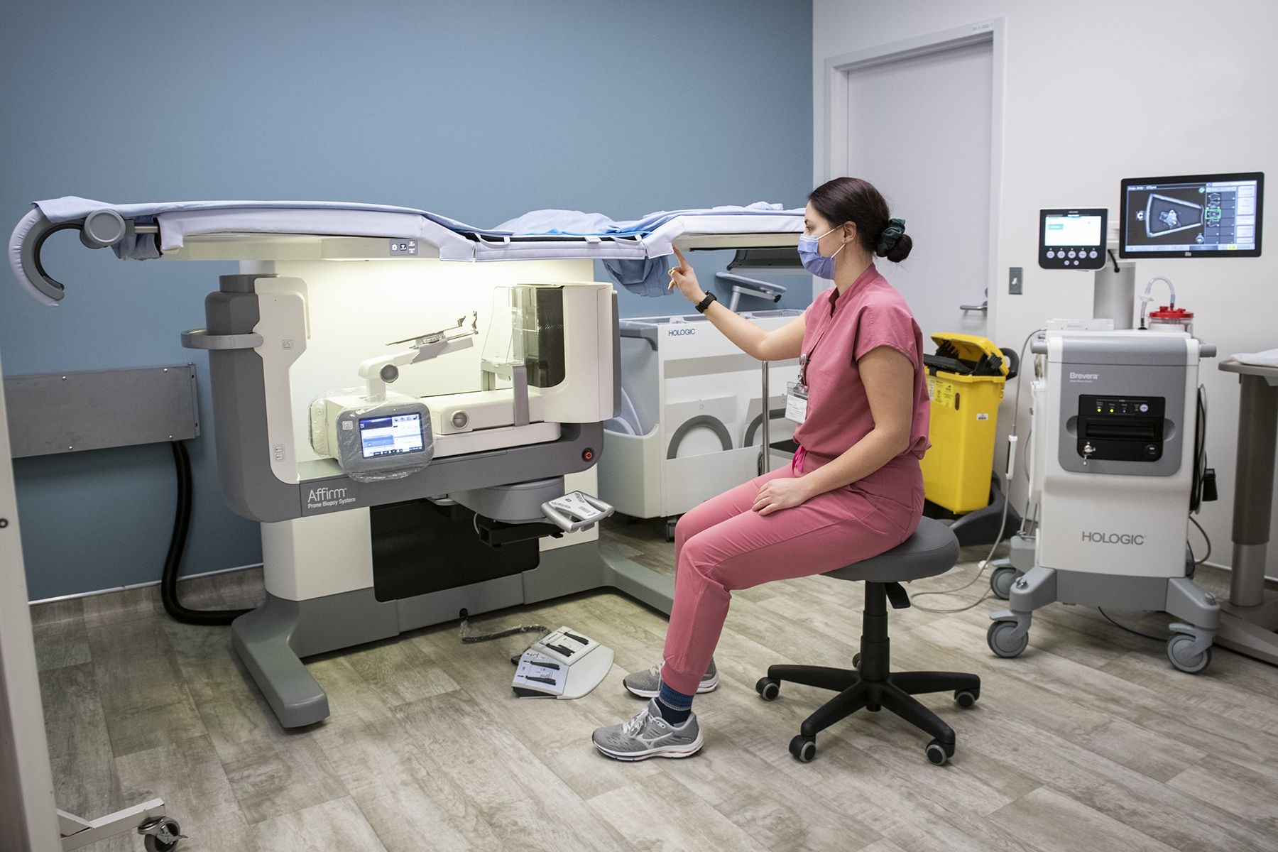 Amanda MacInnis demonstrates the new prone breast biopsy table that helps provide better accuracy, shorter procedures and improved patient comfort for those receiving a breast mammography and biopsy.