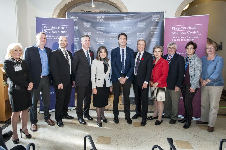 Minister of Health and Long-Term Care Dr. Eric Hoskins, MPP Sophie Kiwala and KHSC President and CEO Dr. David Pichora, pose with honourded guests following the event.
