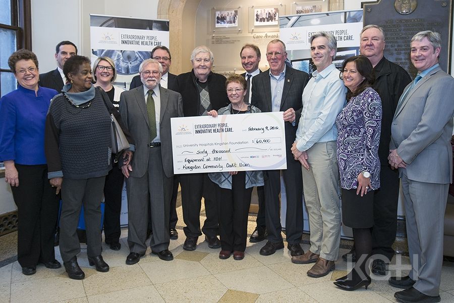 Members of the KCCU, UHKF and KGH Laboratory Services Department during the cheque presentation