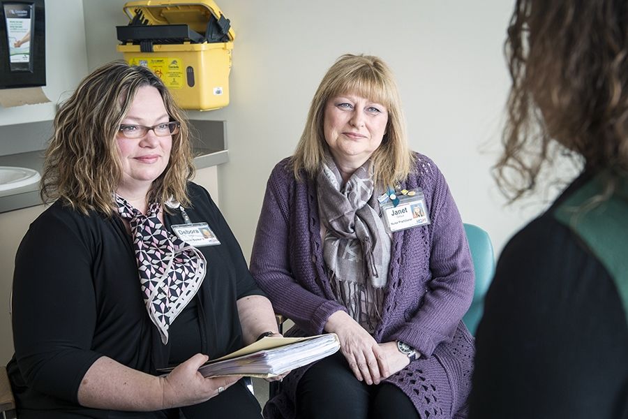 Clinic staff meet with patients to discuss their sexual health