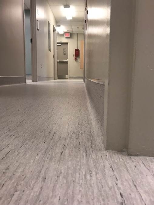 bright, shiny floor leading into renovated clinic